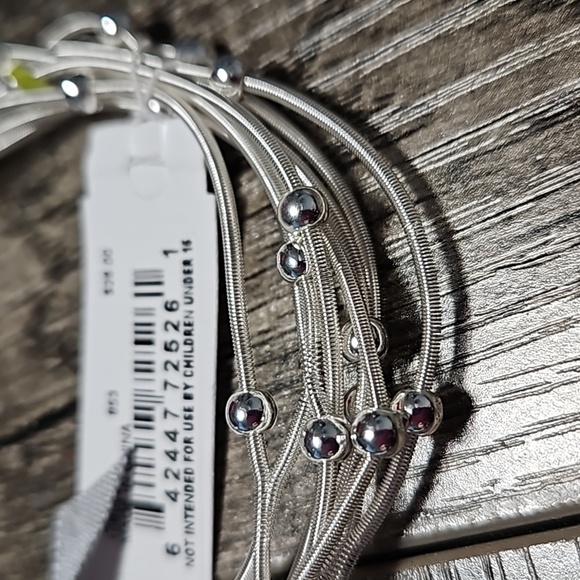 Nine West set of 8 stretch bracelets in shiny silver - with silver beads - Picture 4 of 6
